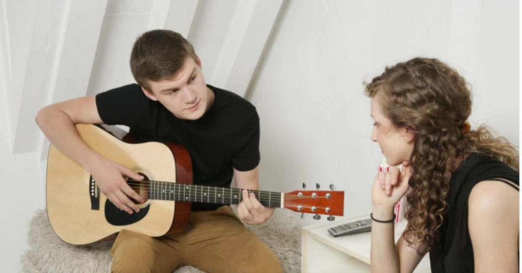 young guy guitar