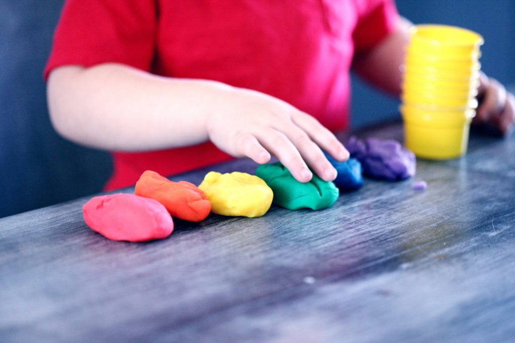 person making clay figures 1449934