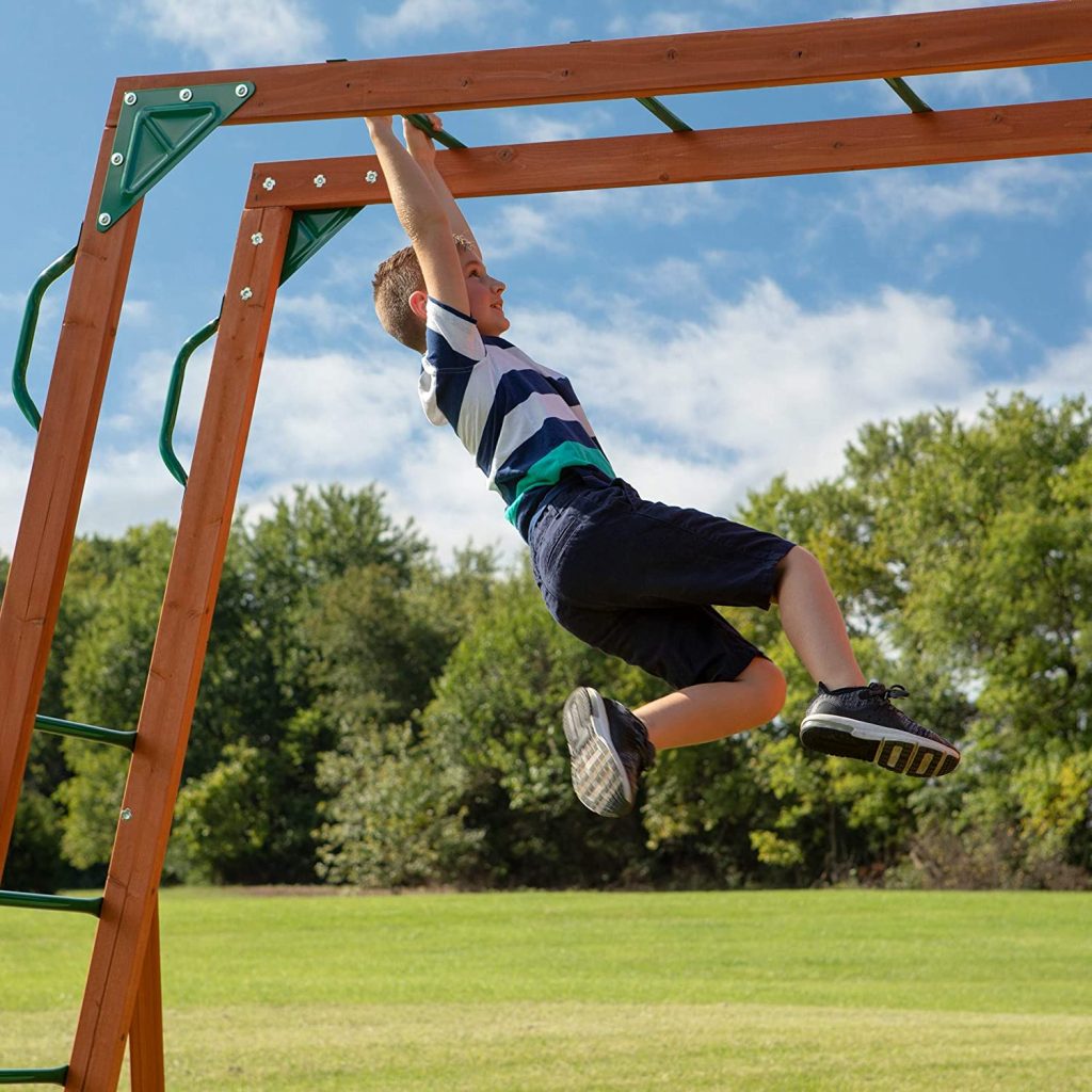 large outdoor playset with monkey bars